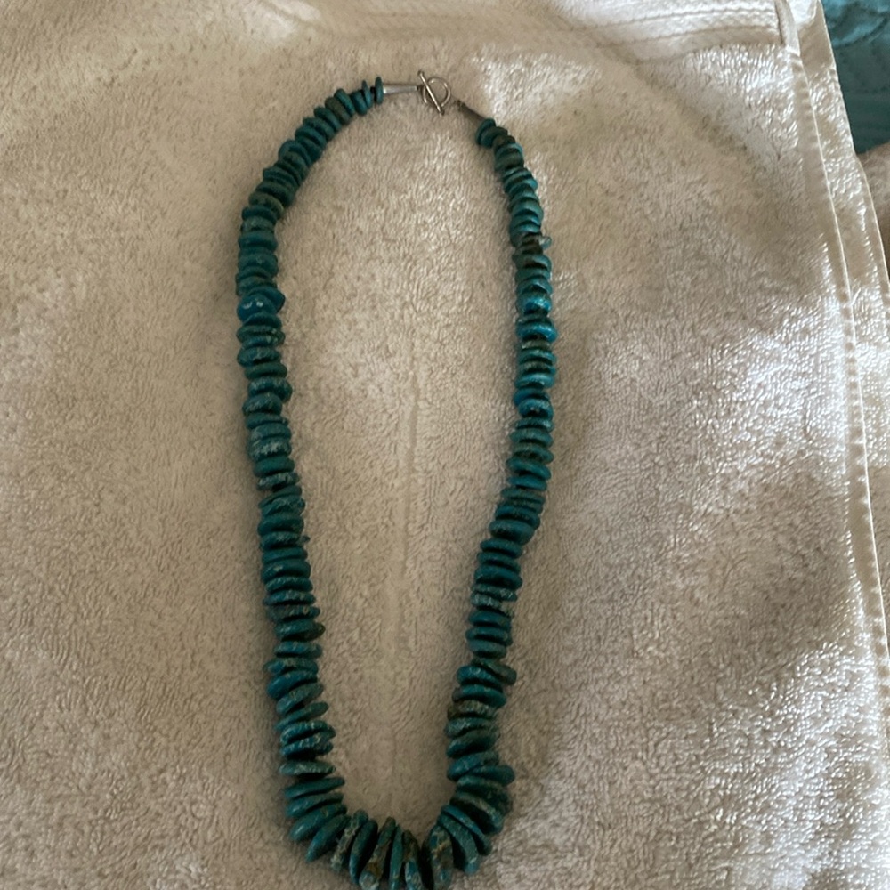 Turquoise and sterling silver 32” necklace. Stunning! Cone sterling silver clasp